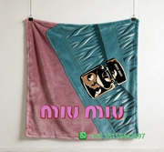 Miumiu Throw Blankets